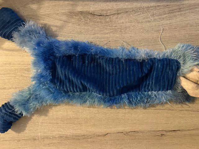 Doudou bleu sans ses bras